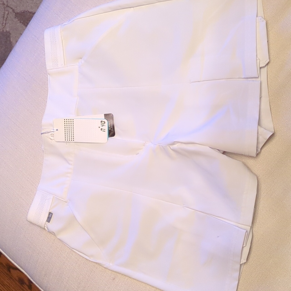 New with tags... Nivo pleated gold shorts